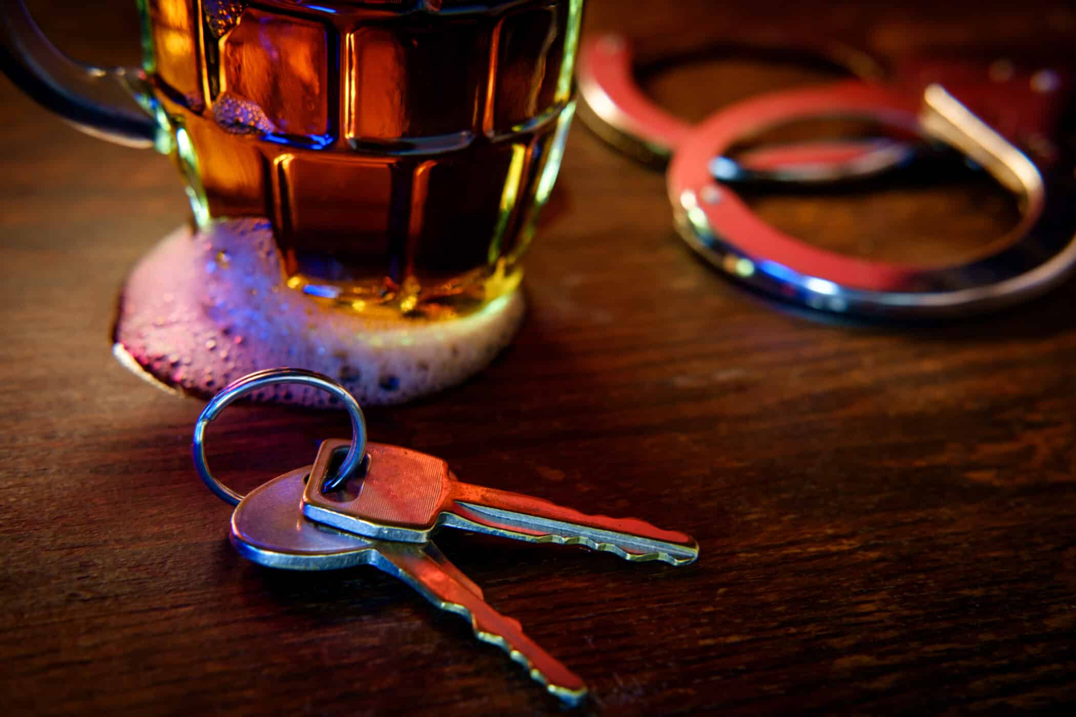 Beer, handcuffs, car keys